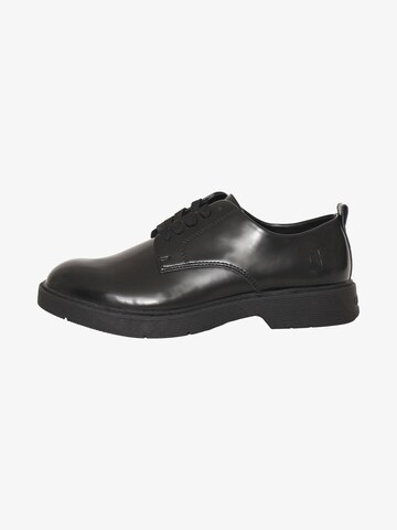 Calvin Klein Flats in Black