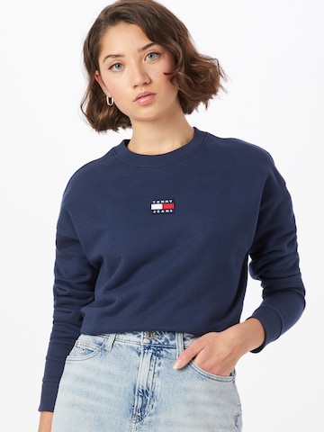 Tommy Jeans كنزة رياضية بلون أزرق: الأمام