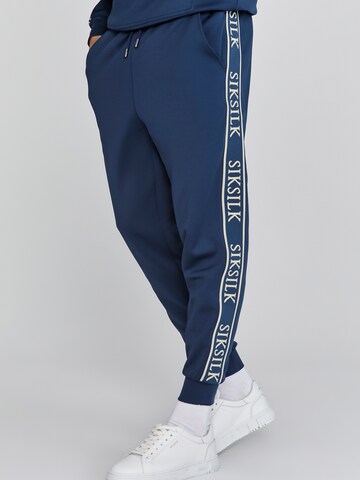 Tapered Pantaloni di SikSilk in blu