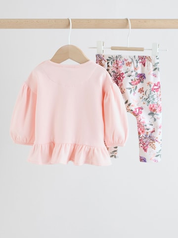 Set Next en rose