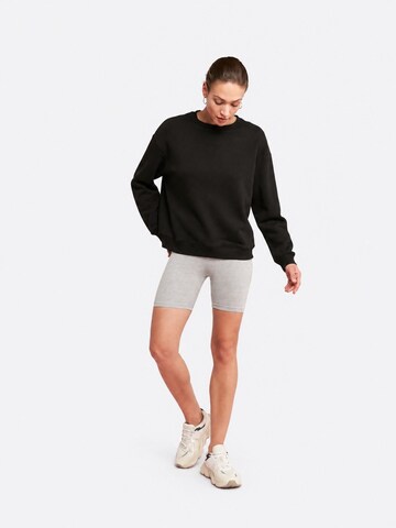 Sweat-shirt Ethiquet en noir