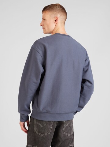 Carhartt WIP Sweatshirt 'American Script' i grå