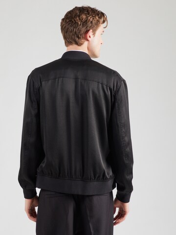 Veste mi-saison 'Nokano 10' DRYKORN en noir