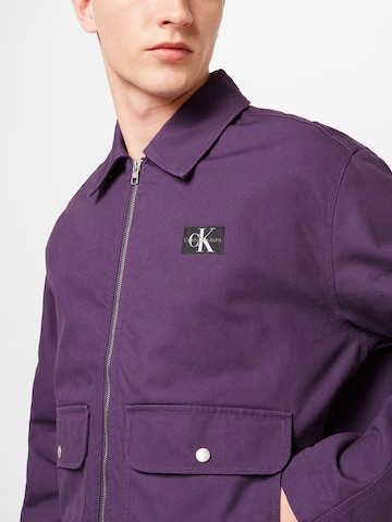 Calvin Klein Jeans Prehodna jakna | vijolična barva