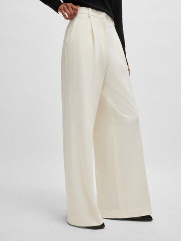 BOSS Flared Pleat-Front Pants 'Tacarana' in White: front