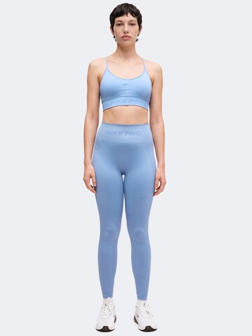 NIKE Skinny Sportbroek in Blauw