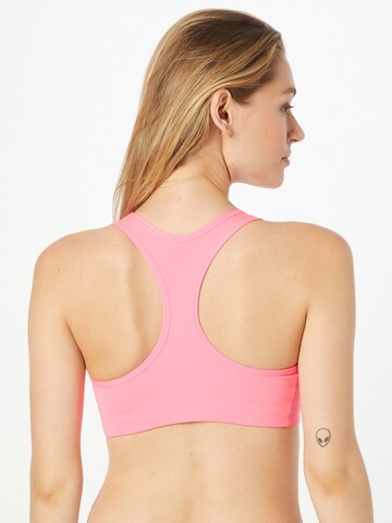 NIKE Bustier Sport bh 'Futura' in Roze