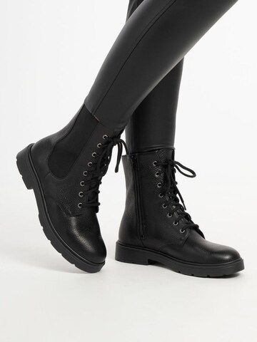 VITAFORM Lace-Up Ankle Boots in Black: front