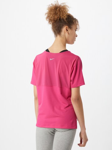 NIKE - Camiseta funcional 'City Sleek' en rosa