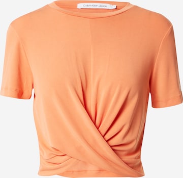 T-shirt Calvin Klein Jeans en orange : devant