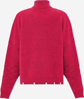 Pullover di faina in rosa