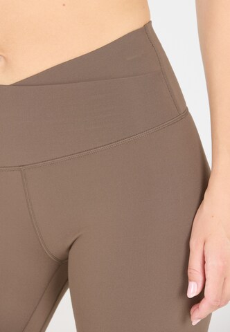 Athlecia Skinny Tights 'Snyder' in Braun