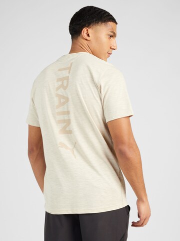 PUMA - Camiseta funcional en beige: frente
