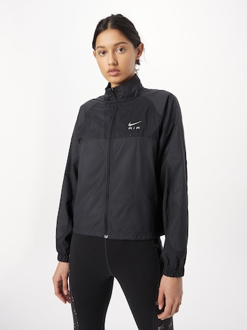 NIKE Sportsjakke i sort: forside