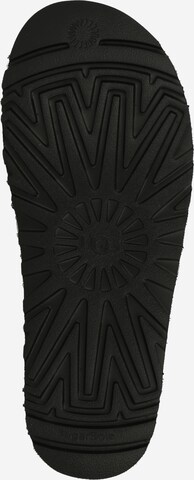 UGG - Sandalias 'Goldenstar' en negro