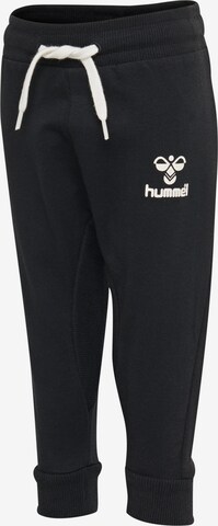 Effilé Pantalon de sport Hummel en noir