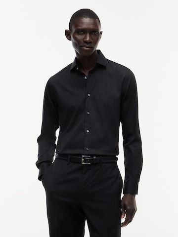 Coupe slim Chemise TOMMY HILFIGER en noir : devant