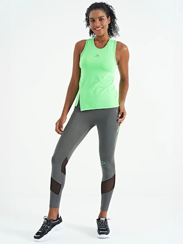 Haut de sport Tommy Life en vert