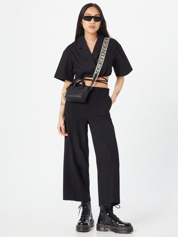 Wide leg Pantaloni di Warehouse in nero