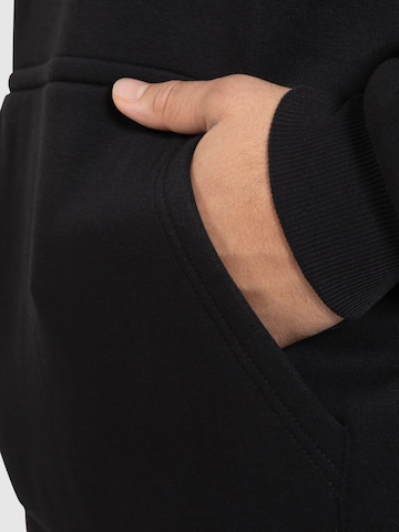 Veste de survêtement 'Rami' Smilodox en noir