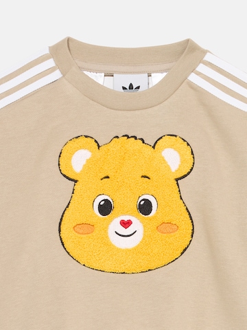 ADIDAS ORIGINALS - Fato de jogging 'Care Bears' em bege