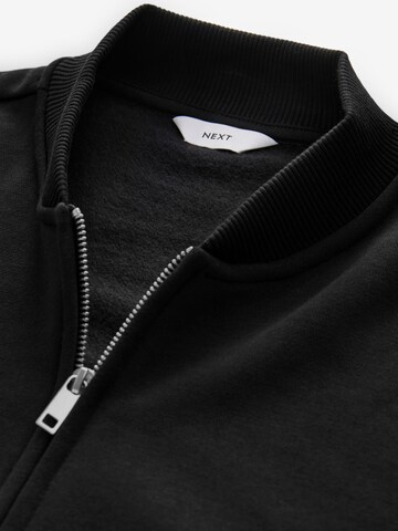 Next - Sudadera con cremallera en negro