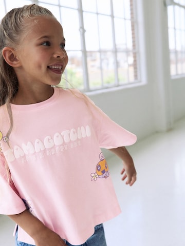 Tricou 'Tamagotchi' de la Next pe roz