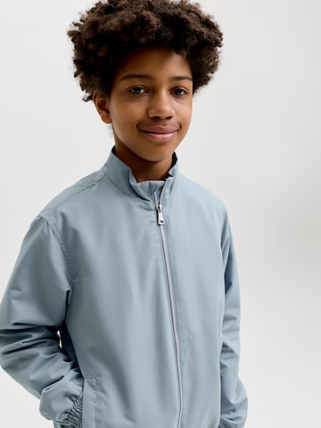 Veste mi-saison 'JORCASSIS' Jack & Jones Junior en bleu