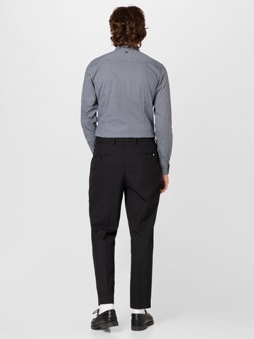 Slimfit Pantaloni cu dungă 'Perin' de la BOSS Black pe negru