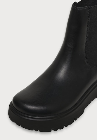 BIRKENSTOCK - Botas Chelsea 'Theda' en negro