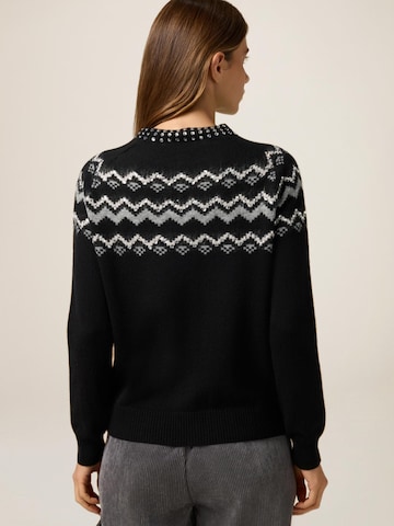 Pullover di oltre in nero