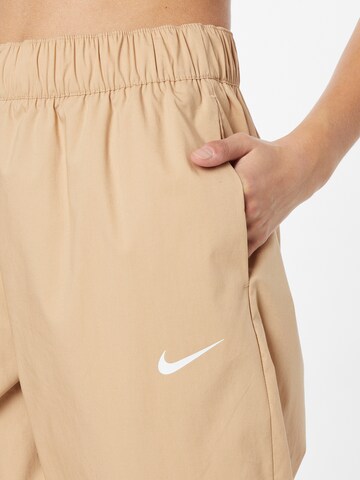 Nike Sportswear Loose fit Pants in Beige