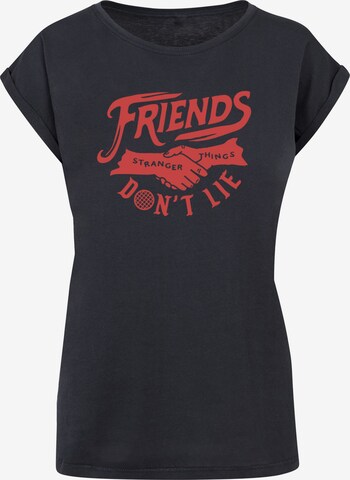 ABSOLUTE CULT T-Shirt 'Stranger Things - Friends Dont Lie' in Blau: predná strana