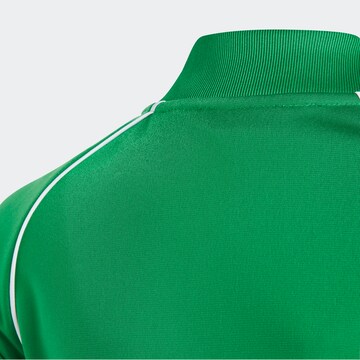 ADIDAS ORIGINALS Träningsoverall 'Adicolor Sst' i grön