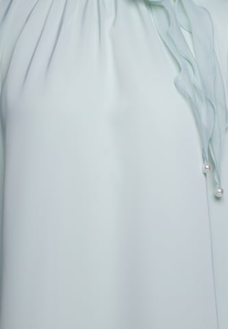faina - Blusa 'GLOW' en verde
