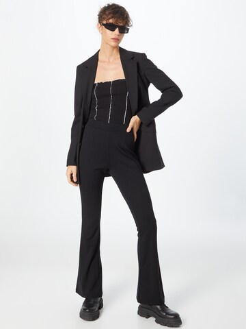 Cartoon Bootcut Hose in Schwarz