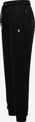 NAVAHOO - Tapered Calças em preto