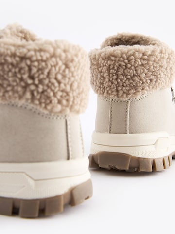 Bottes Next en beige