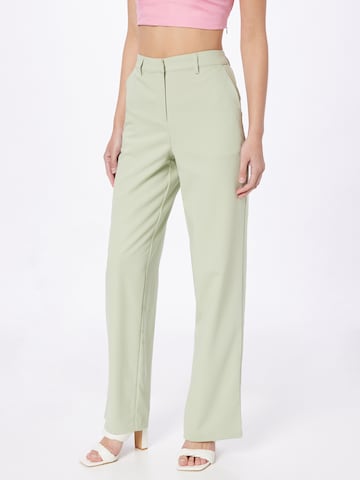 NA-KD Loose fit Pants 'Lisa & Lena' in Green: front