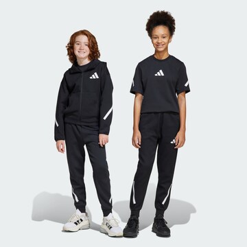 ADIDAS SPORTSWEAR Tapered Sports trousers 'Z.N.E.' in Black: front