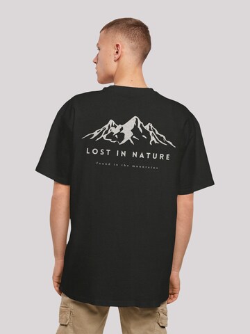 T-Shirt 'Lost in nature' F4NT4STIC en noir : devant