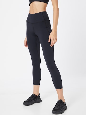 UNDER ARMOUR Skinny Sports trousers in Black: front