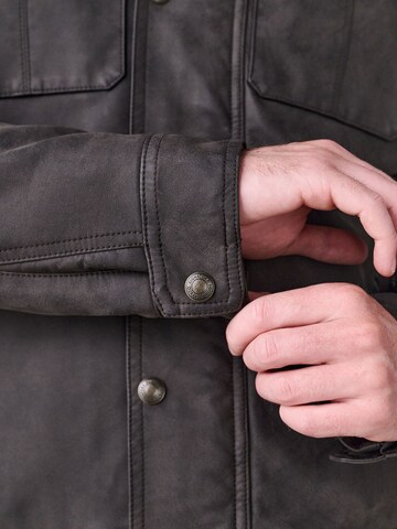 Next Tussenjas in Bruin