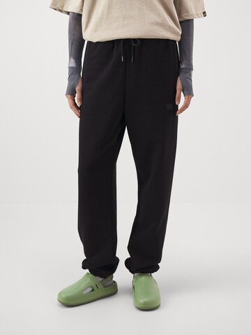 ALPHA INDUSTRIES Tapered Παντελόνι 'Essentials' σε μαύρο: μπροστά