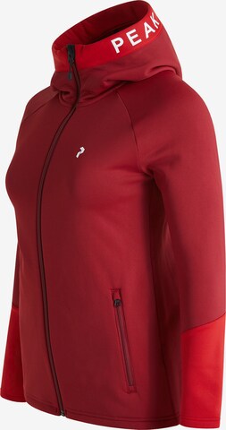 PEAK PERFORMANCE Fleecejacke W Rider Zip Hood in Rot