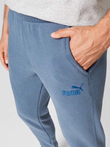 PUMA Дънки Tapered Leg Спортен панталон в синьо