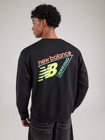 Sweat-shirt new balance en noir : devant