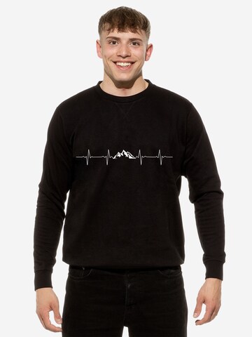 Cotton Prime Sweatshirt 'Pulsschlag Berge' in Zwart: voorkant