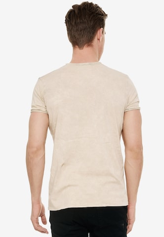 Rusty Neal T-Shirt mit zeitlosem Print in Beige