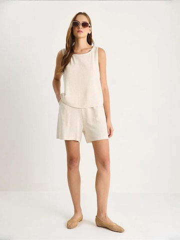 Pantalons de tailleur Bianco Lucci en beige